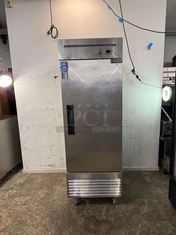 Dukers D28R refrigerator, 27.5" wide, single right hinge door, 115v, stainless steel, visible label, excellent condition.