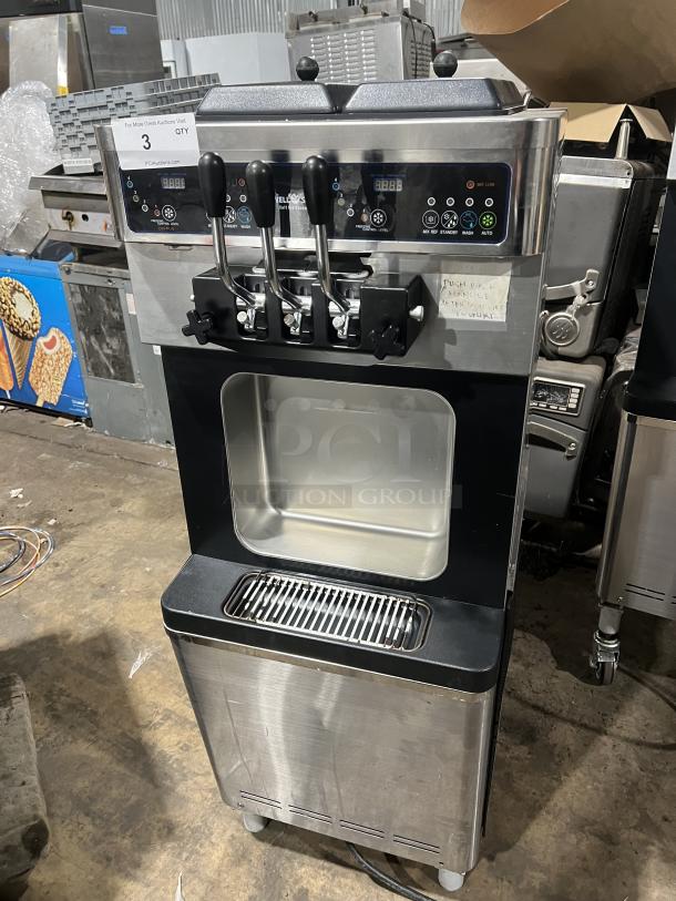 Well Spring SSI-143S stainless steel soft serve machine, 2 hoppers, 3 dispensers, digital controls, drip tray, on casters.