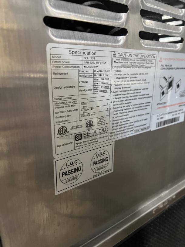Well Spring SSI-143S stainless steel ice cream machine. Features dual hoppers, 3 dispensers, drip tray, and digital controls. 220V.