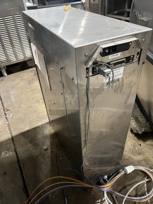 Taylor Flavor Burst Model C707-27 frozen yogurt machine. Features digital temperature indicator. Stainless steel, with visible wiring.