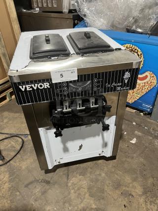 Vevor YKF8218T soft serve machine, 3 flavors, 2 hoppers, electric-powered, stainless steel, visible wear, auction label.
