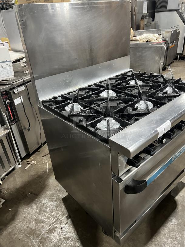 Turbo Air Radiance Series 6 Burner Range/Oven Combo, stainless steel, natural gas, wired rack, backsplash, on casters.