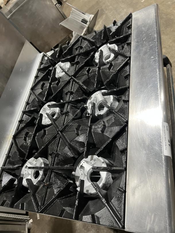 Turbo Air Radiance Series 6 Burner Range/Oven, stainless steel, natural gas, oven rack, backsplash, on casters, excellent condition.