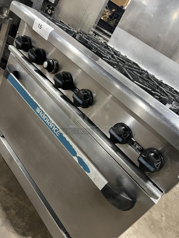 Turbo Air Radiance Series 6-burner stainless steel gas range/oven combo, with wired oven rack, backsplash, on casters.