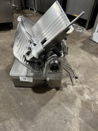 Hobart Model 1712 stainless steel deli meat slicer, 115V, 1-phase, on legs, in good condition.