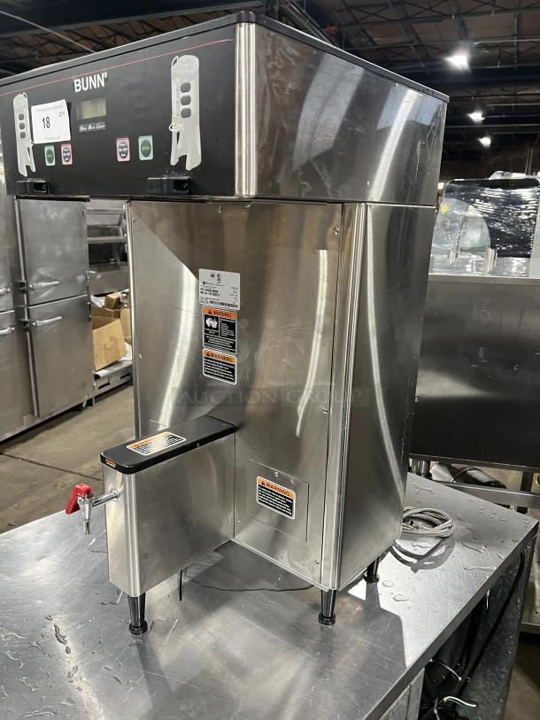Bunn ThermoFresh Series Dual Coffee Brewer, Model DUALTFDBC, stainless steel, with hot water dispenser, digital control, on legs.
