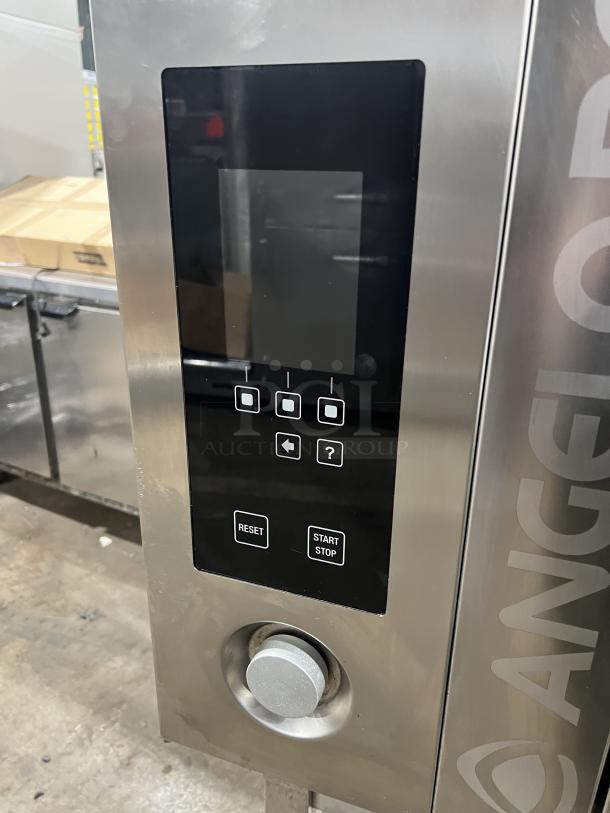 Angelopo FX61G3-UKX02 commercial stainless steel combi oven, natural gas, with control touch display, on legs.