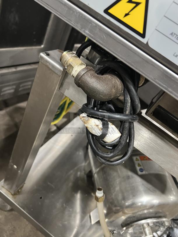 Angelopo stainless steel combi oven, Model FX61G3UKX02, showing wiring and connectors. Features touch control display.