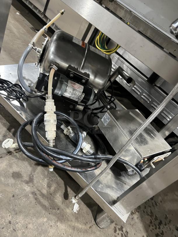 Angelopo FX61G3-UKX02 combi oven, stainless steel, natural gas, touch display, wired racks, 120V, on legs, control unit visible.