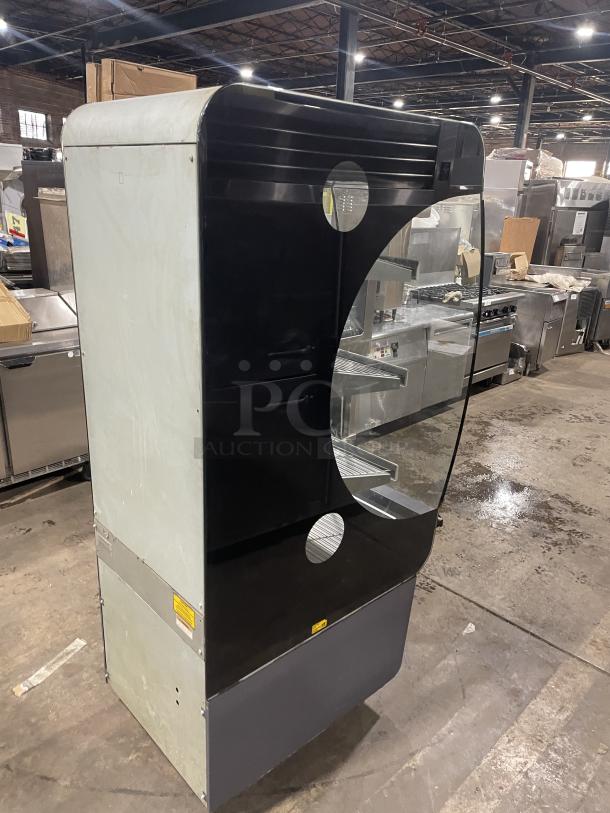Fri-Jado CLD25 heated display case, 208V, 1 phase, electric, open grab-n-go style, black exterior, good condition.