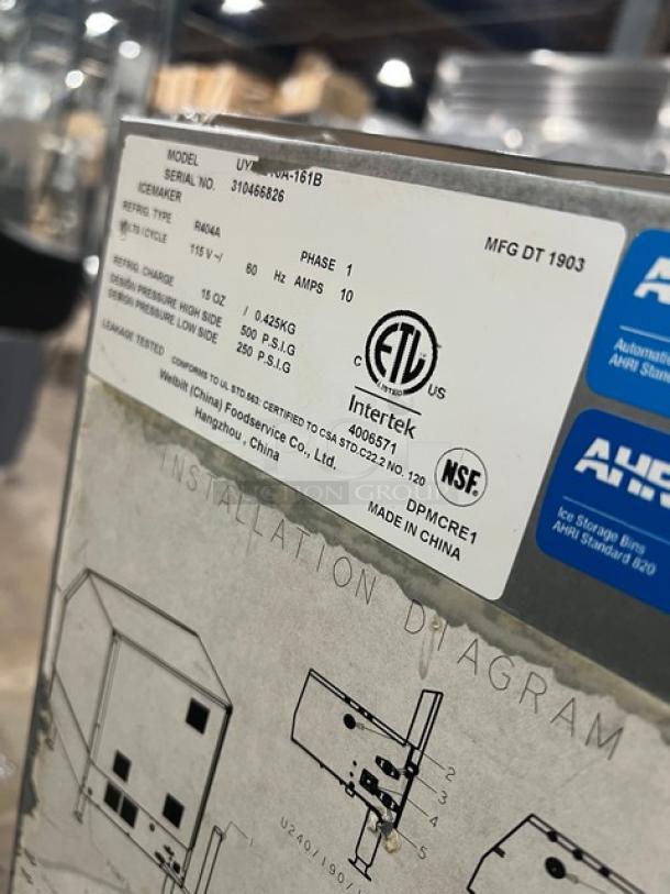 Manitowoc stainless steel undercounter ice making machine, SN 310466826, 115V 1 phase, ETL certified, with installation diagram.