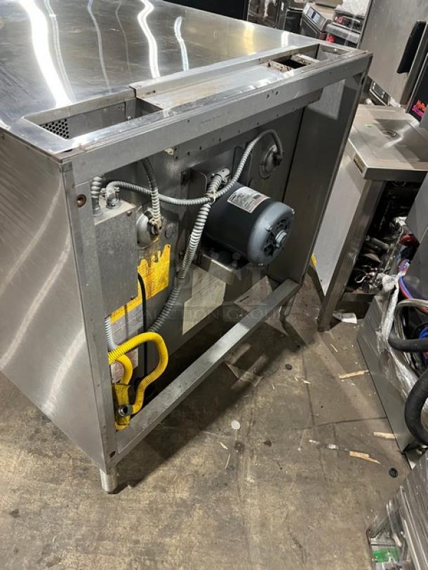 Blodgett stainless steel electric convection oven, single stacked, on legs, with wired oven rack and visible wiring.