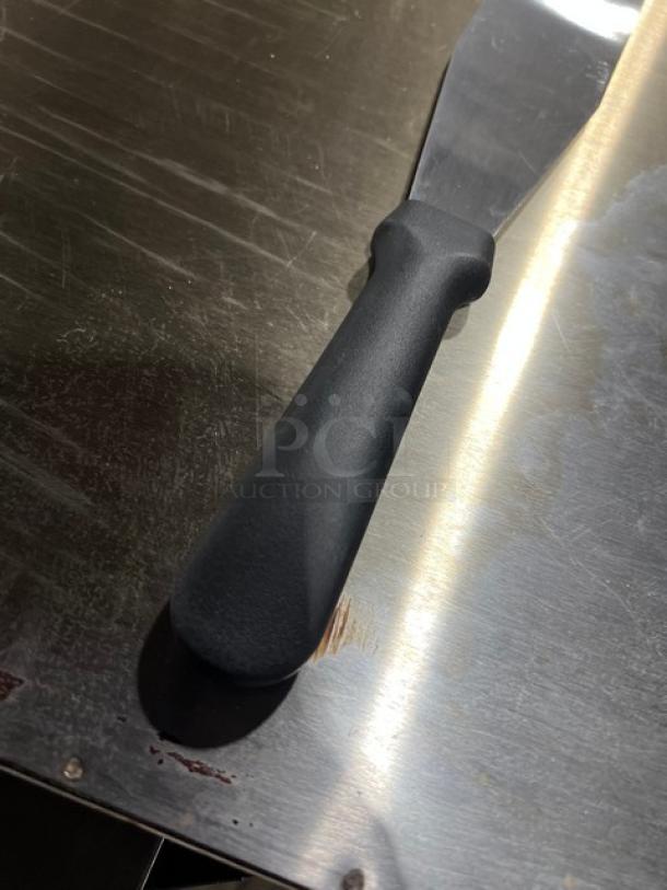 Ateco Ultra Series stainless steel 14" straight spatula, model 1314, with black grip handle, new condition.