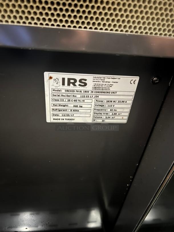 IRS Orchid76SL1800 refrigerated display case label. Shows model, serial number 1220317/04, 110V, made in Turkey.