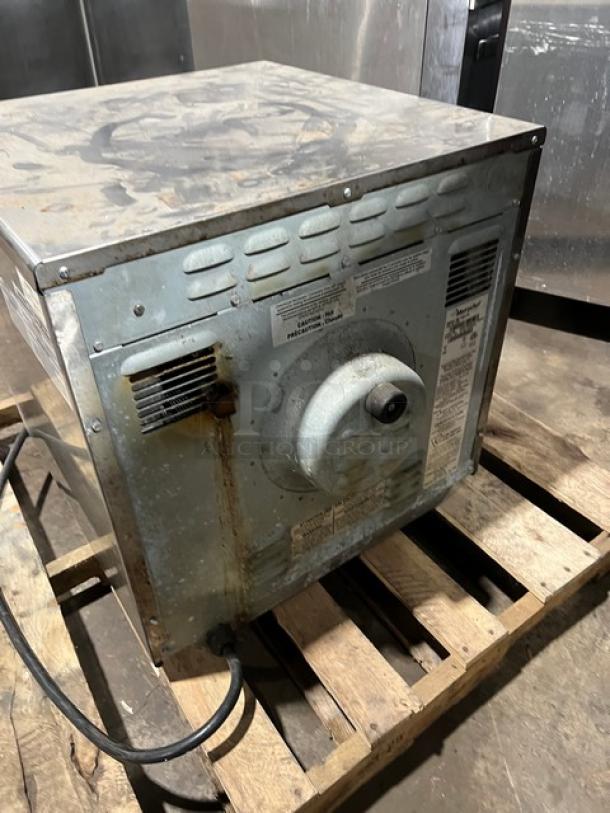 Merrychef eikone4s commercial stainless steel convection oven with digital touch controls. Visible wear and rust. Model: eikone4s.