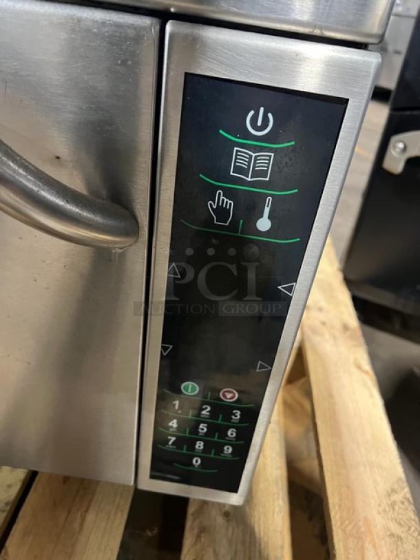 2011 Amana AXP20 stainless steel rapid cook oven with control panel and wired racks, commercial-grade, SN: 1106101609.