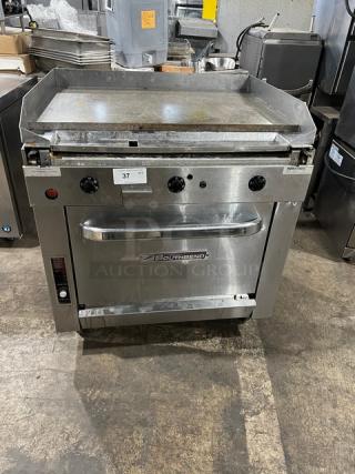 Southbend Commercial Stainless Steel Natural Gas Powered Flat-Griddle Top Range & Oven Combo! With Wired Oven Racks! Model: P36A-TTT SN: 25B17419! On Casters! - Item #1224160