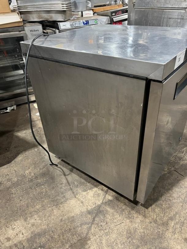 Hoshizaki UF27B stainless steel undercounter freezer, single door, poly-coated oven racks, used, serial M50238A.
