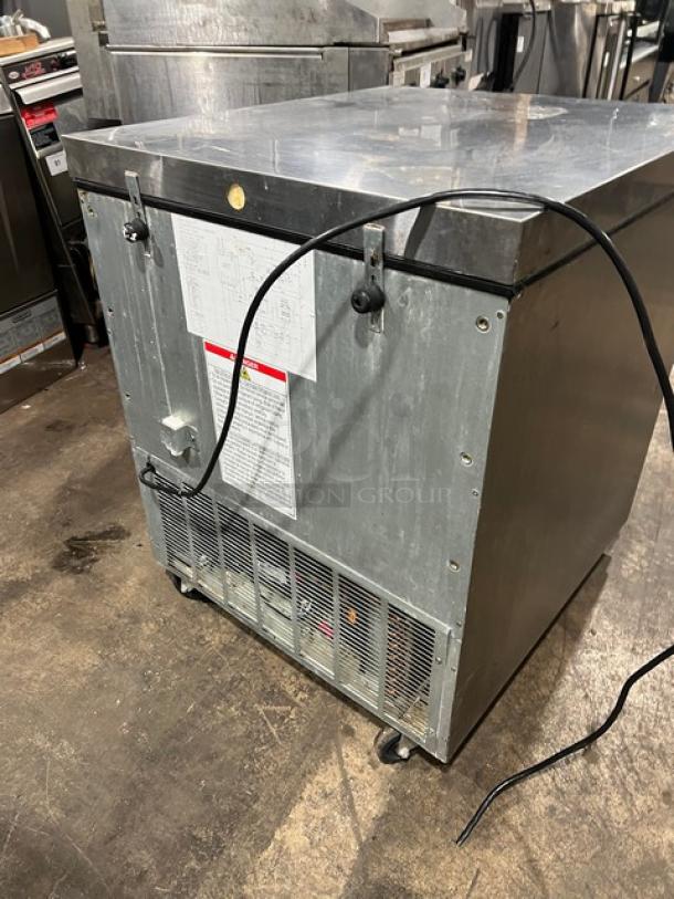 Hoshizaki UF27B undercounter stainless steel freezer, solid door, poly coated oven racks, visible vent; Model: UF27B, SN: M50238A.