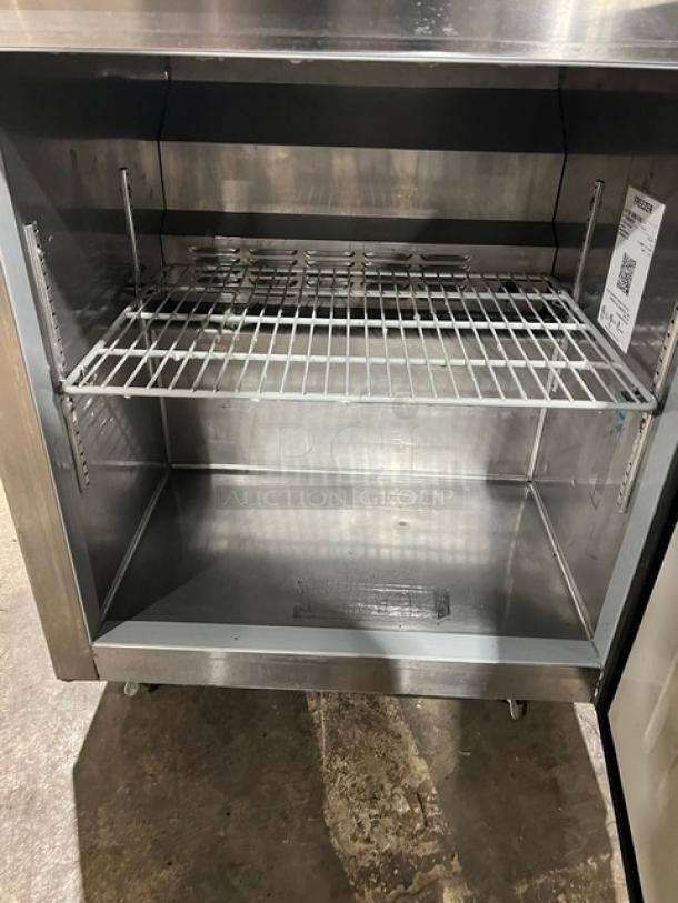 Hoshizaki UF27B undercounter freezer, stainless steel, one solid door, poly-coated oven racks, excellent condition.