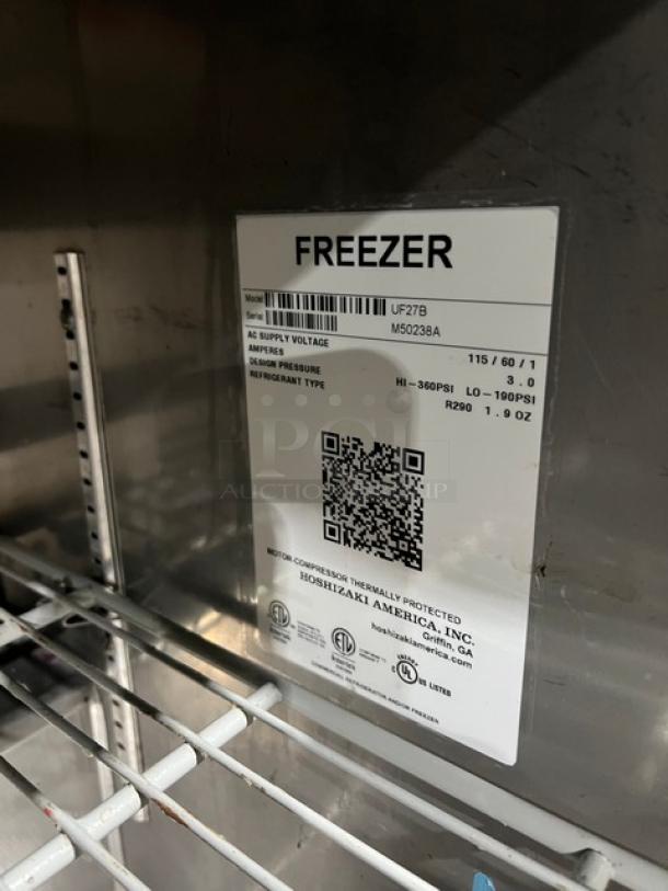 Hoshizaki UF27B stainless steel undercounter freezer with poly-coated oven racks, serial number M50238A, in good condition.