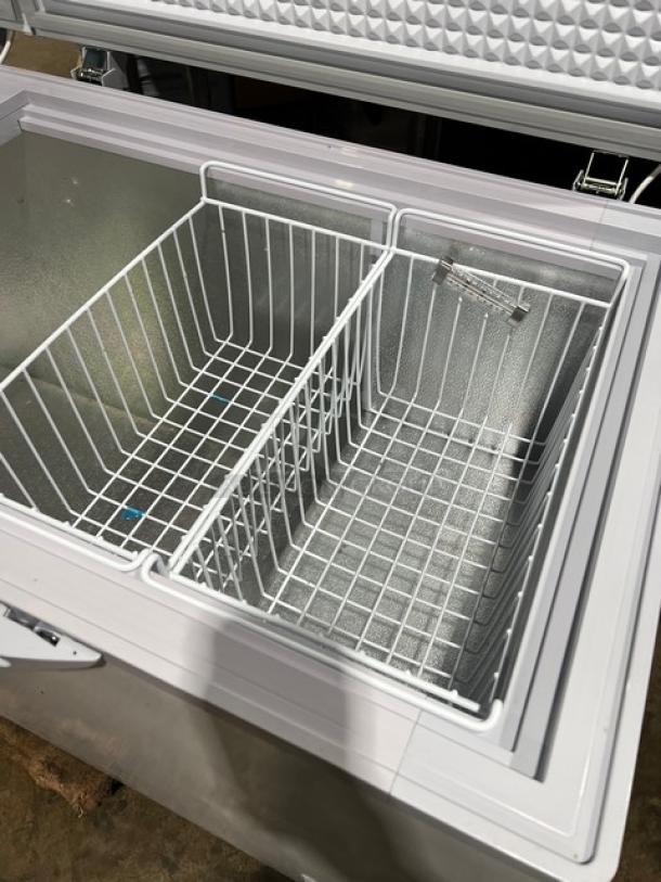 KoolMore SCF-20C commercial chest freezer open, showing poly-coated wire baskets. White, late 2024 model, 115V.