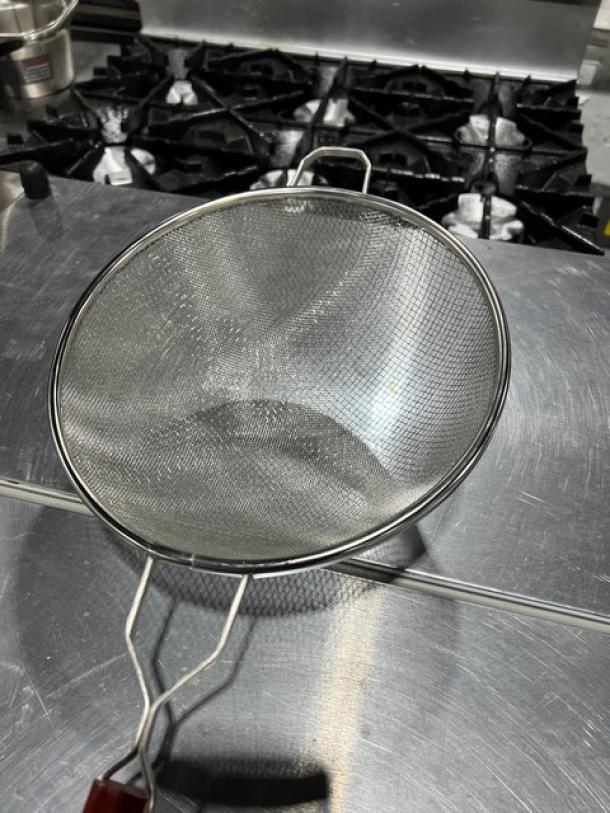 NEW Adcraft Deluxe 10" Double Mesh Strainer, Model DSM-10. Stainless steel, excellent condition. Ideal for kitchen use.