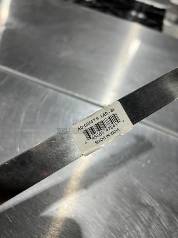 Adcraft Commercial Stainless Steel 24 Oz. Serving Ladle, Model LAD-24, features a tag with model number and made in India.