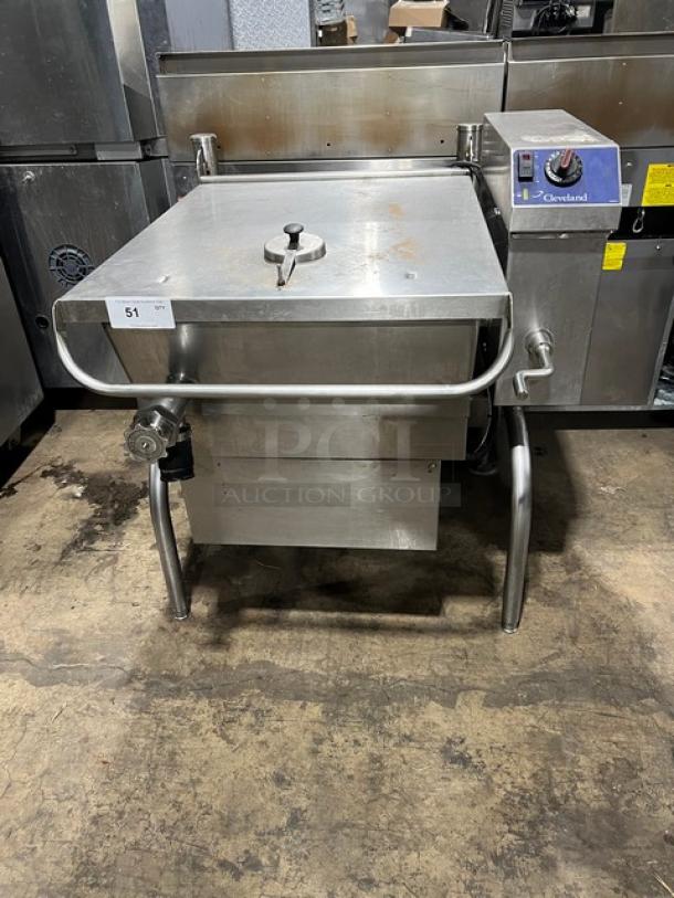 Cleveland commercial stainless steel natural gas tilt skillet, 115V 1 phase, open base, control panel with markings.