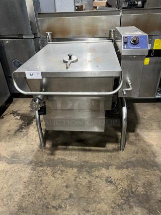 Cleveland commercial stainless steel natural gas tilt skillet, 115V 1 phase, open base, control panel with markings.