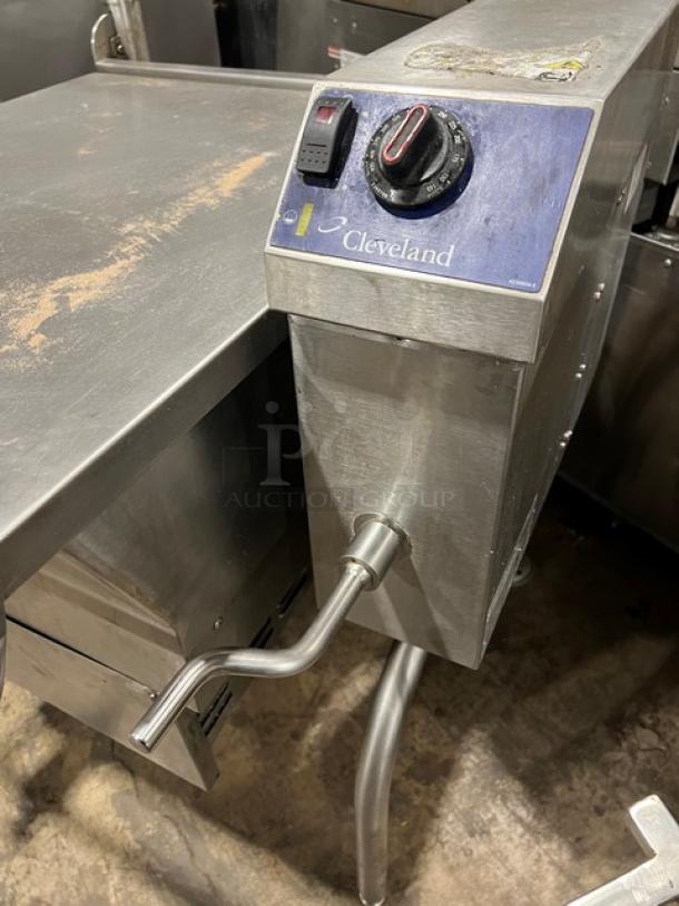 Cleveland stainless steel natural gas tilt skillet, open base, 115V, 1 phase, control panel visible, good condition.