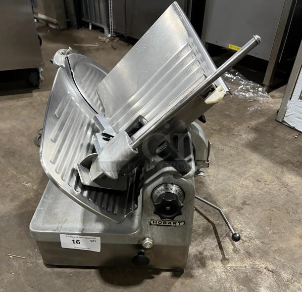 Hobart Model 1712 stainless steel deli meat slicer, 115V, 1-phase, on legs, in good condition.