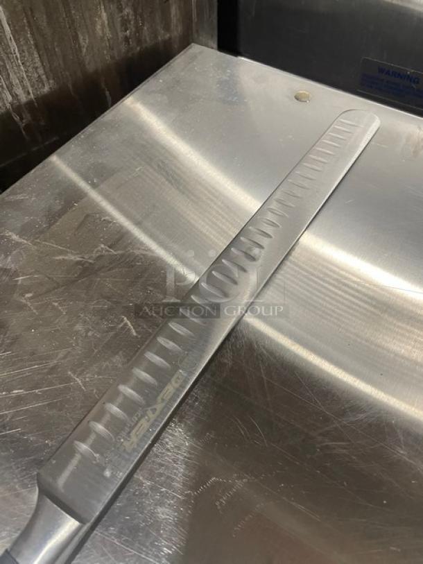 Brand new Dexter Russell I-Cut Pro Series 12" duo-edge slicing knife, stainless steel, black grip, model 30409.