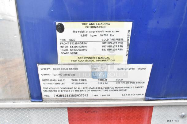 Manufacturer's label on a 2021 Cruising Kitchens 24' fast food trailer. Includes tire and loading info, GVWR: 7031 kg.