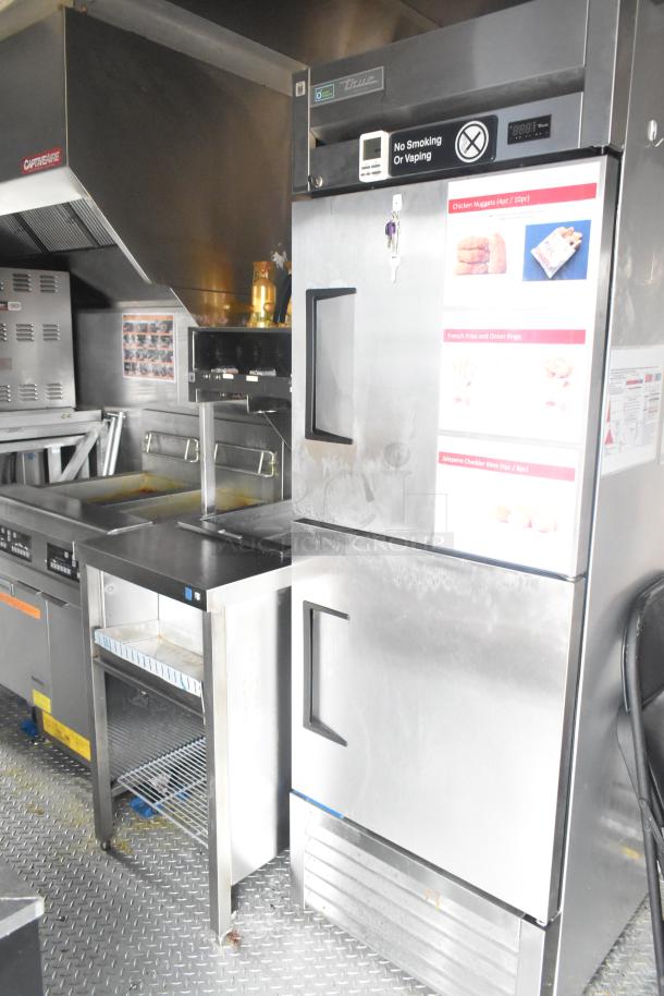 Cruising Kitchens 24' Burger King trailer with CaptiveAire hood, Nieco charbroiler, True freezers, Frymaster fryer, and more.