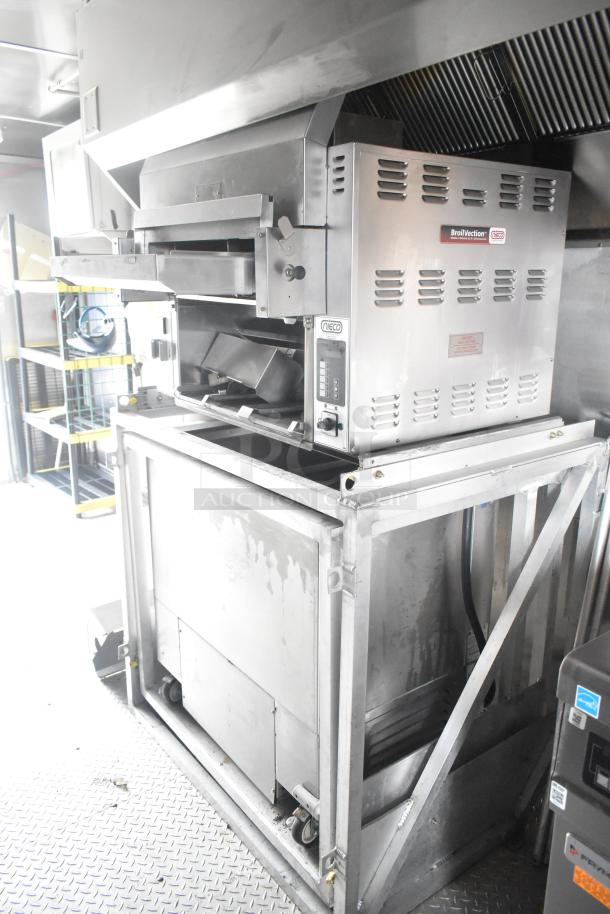 Cruising Kitchens 24' Burger King fast food trailer with Nieco BroilVection grill, commercial equipment, and CaptiveAire hood.