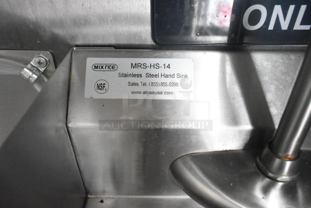 Stainless steel hand sink with NSC and MixRite labeling, model MRS-HS-14, installed in mobile kitchen trailer.