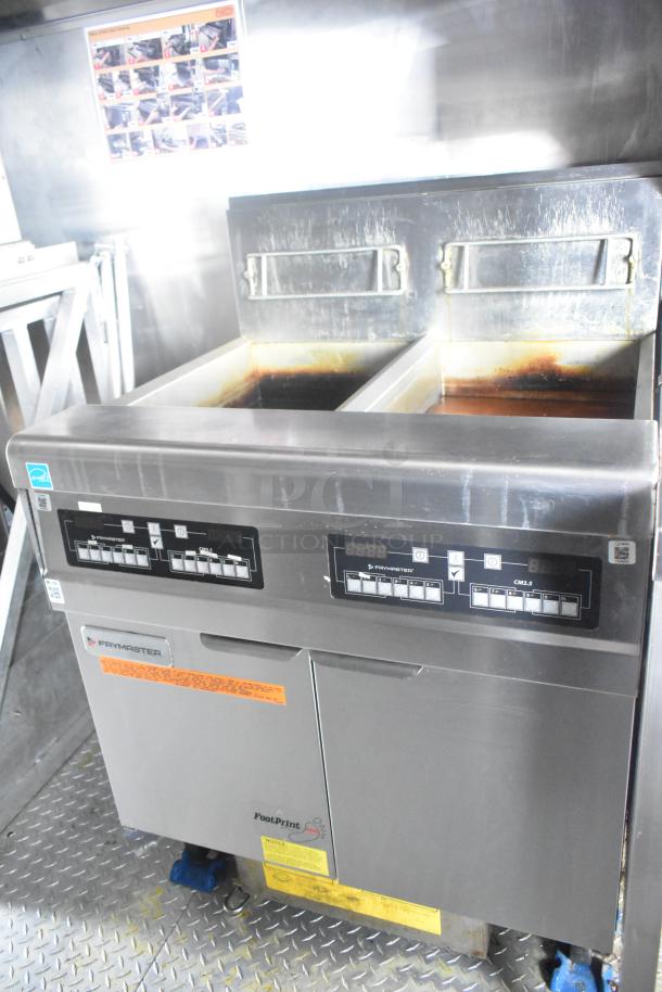 Frymaster 2-bay gas fryer in a Burger King mobile kitchen trailer, featuring digital controls and stainless steel finish.