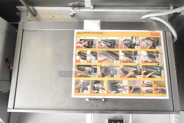 Nieco JF93-2E charbroiler grill with a daily cleaning instruction guide, part of a fully equipped mobile kitchen.
