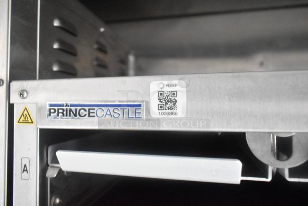 Prince Castle industrial equipment with REEF QR code label, serial 1006866. Includes heat warning sign and metal construction.