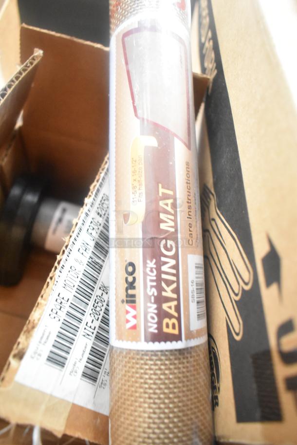 Winco non-stick baking mat in packaging, fits half-size pan, surrounded by cardboard boxes.