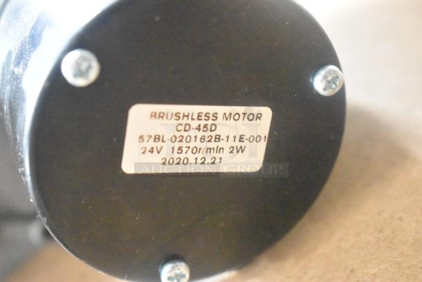 Brushless motor CD-45D label showing 57BL-020162B-11E-001, 24V, 1570r/min, 2W, dated 2020.12.21.