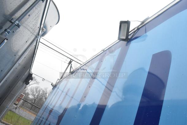 24' Cruising Kitchens fast food trailer, features include CaptiveAire hood, fire system, Nieco grill, True freezers; sold with clear title.