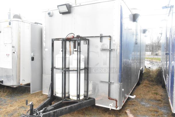 ATX 24' food trailer, 2021 model, fully equipped with commercial-grade appliances, exterior shown with propane tank setup.