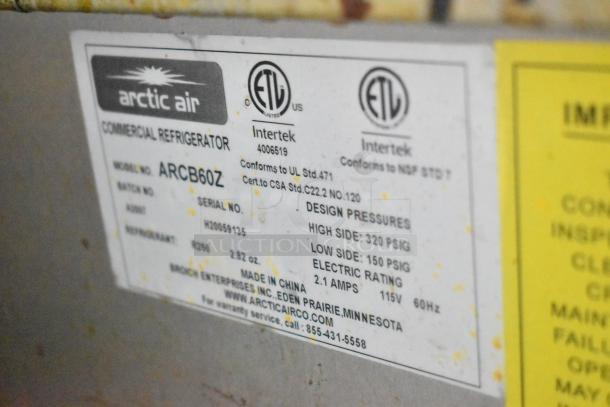 Label on Arctic Air Commercial Refrigerator, Model ARCB60Z, with design pressure and electric rating details.