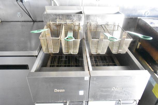Dual Dean gas fryers with baskets in a mobile kitchen trailer, showcasing commercial-grade equipment, excellent condition.