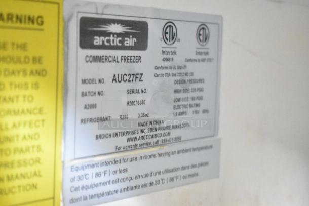 Arctic Air commercial freezer label, model AUC27FZ, with technical specifications and contact information.