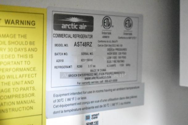 Arctic Air commercial refrigerator label, model AST48RZ, batch A2010, serial H20115686, R290 refrigerant.