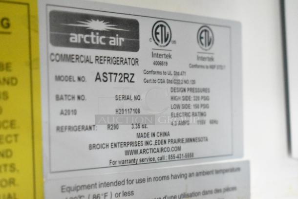 Arctic Air commercial refrigerator label, model AST72RZ, with details on design pressures, refrigerant, and manufacturer info.