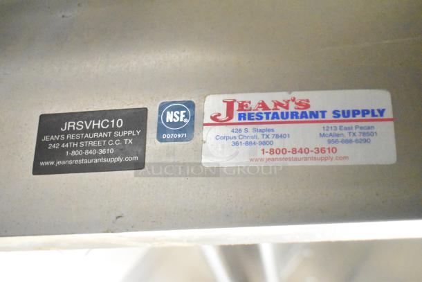 Tags on ATX food trailer display "Jean's Restaurant Supply" contact info and NSF certification.